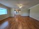 Spacious living room with gleaming hardwood floors at 10330 Sw 99Th Ave, Ocala, FL 34481