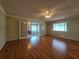Living room with hardwood floors and bright windows at 10330 Sw 99Th Ave, Ocala, FL 34481