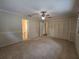 Spacious carpeted main bedroom with ensuite bathroom at 10330 Sw 99Th Ave, Ocala, FL 34481