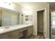 The primary bath has a double sink vanity and ample counterspace at 11609 Sw 59Th Ter, Ocala, FL 34476