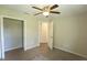 Bedroom with walk-in closet and en suite bath at 11609 Sw 59Th Ter, Ocala, FL 34476