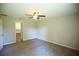 Spacious bedroom has neutral carpet and is adjacent to the ensuite bath at 11609 Sw 59Th Ter, Ocala, FL 34476