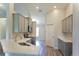 Well-lit kitchen with modern cabinets, stainless steel appliances, and ample counter space at 11609 Sw 59Th Ter, Ocala, FL 34476