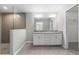 Modern bathroom featuring granite countertops, dual sinks, and walk-in shower at 12953 Sw 85Th Pl, Dunnellon, FL 34432