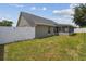Backyard with screened in porch and privacy fence at 1317 Ravida Woods Dr, Apopka, FL 32703