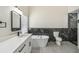 Modern bathroom with a sleek vanity, standalone tub and shower at 1317 Ravida Woods Dr, Apopka, FL 32703