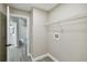 Laundry room with shelving and wash/dryer hookups at 1317 Ravida Woods Dr, Apopka, FL 32703