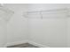 Spacious walk-in closet with white walls, trim and wire shelving for easy storage and organization at 1317 Ravida Woods Dr, Apopka, FL 32703