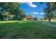 Charming single-story home with mature landscaping, and a well-manicured lawn at 13232 Ne 39Th Ter, Anthony, FL 32617