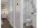 Inviting bathroom featuring modern vanity, framed art, and decorative shower curtain, enhancing the welcoming feel of the space at 13618 Sw 111Th Cir, Dunnellon, FL 34432