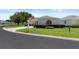 Quaint single Gathering home featuring a two-car garage, concrete drive, and well maintained lawn at 13618 Sw 111Th Cir, Dunnellon, FL 34432