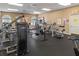 Community gym featuring weight machines, free weights, and workout equipment at 13618 Sw 111Th Cir, Dunnellon, FL 34432