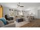 Inviting living room boasts an open layout, hardwood floors, and lots of natural light at 13618 Sw 111Th Cir, Dunnellon, FL 34432