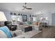Inviting living room with stylish furnishings, ceiling fan, and hardwood floors at 13618 Sw 111Th Cir, Dunnellon, FL 34432