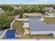 Aerial view of backyard features a shed, patio, privacy fence, and mature landscaping at 14118 Sw 32Nd Terrace Rd, Ocala, FL 34473