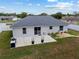 This overhead view highlights the backyard's patio, lawn, storage shed, and full fencing for privacy at 14118 Sw 32Nd Terrace Rd, Ocala, FL 34473
