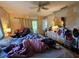 Bedroom with peeling paint and ceiling fan at 15920 Sw 49Th Court Rd, Ocala, FL 34473