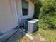 Exterior close up of an AC unit on the side of the home at 15920 Sw 49Th Court Rd, Ocala, FL 34473
