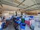 Cluttered garage offering potential for storage and organization solutions, with ample space at 15920 Sw 49Th Court Rd, Ocala, FL 34473