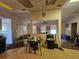 This room features neutral walls, wood trim, and large windows at 15920 Sw 49Th Court Rd, Ocala, FL 34473