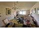 A bright and airy open-concept living room with a dining area at 15920 Sw 49Th Court Rd, Ocala, FL 34473