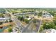 Expansive overhead shot of commercial district showing businesses, roadways, and surrounding green spaces at 1640 Ne 40Th Ave # 107, Ocala, FL 34470