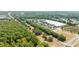 Overhead view of a commercial area featuring a large retail store and abundant parking at 1640 Ne 40Th Ave # 107, Ocala, FL 34470