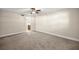 Neutral bedroom with ceiling fan and carpet flooring at 1640 Ne 40Th Ave # 107, Ocala, FL 34470