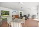 Bright, inviting clubhouse with ample seating, ceiling fans, and a barbecue grill at 1640 Ne 40Th Ave # 107, Ocala, FL 34470