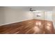 Spacious living room featuring hardwood floors and a ceiling fan at 1640 Ne 40Th Ave # 107, Ocala, FL 34470