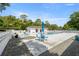 Community pool area with ample seating, a clubhouse, and well-maintained surroundings at 1640 Ne 40Th Ave # 107, Ocala, FL 34470