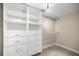 Walk-in closet with adjustable shelving and drawers at 1640 Ne 40Th Ave # 107, Ocala, FL 34470