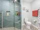 Bright bathroom with stylish tilework, glass shower, and updated fixtures at 16954 Se 93Rd Cuthbert Cir, The Villages, FL 32162