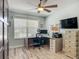 Office bedroom with murphy bed, work station and bright laminate floors at 16954 Se 93Rd Cuthbert Cir, The Villages, FL 32162