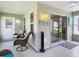 Relaxing enclosed patio with casual seating, screening and ceiling fan at 16954 Se 93Rd Cuthbert Cir, The Villages, FL 32162