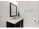 Classic half-bathroom featuring a vanity, mirror, and modern fixtures at 170 Sw 80Th St, Ocala, FL 34476