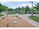 The home with a circular driveway, fountain, and beautifully manicured front lawn at 170 Sw 80Th St, Ocala, FL 34476