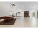 Spacious living room features a pool table, stone fireplace, and vaulted ceilings at 170 Sw 80Th St, Ocala, FL 34476