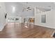 Bright and airy living room with hardwood floors, vaulted ceilings, and plenty of natural light at 170 Sw 80Th St, Ocala, FL 34476