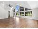 Bright living room with hardwood floors and lots of large windows for natural light at 170 Sw 80Th St, Ocala, FL 34476
