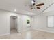 Bright primary bedroom with tiled flooring, vaulted ceilings and view of the pool at 170 Sw 80Th St, Ocala, FL 34476