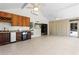 Bright sun room with tile floors, ceiling fans, and a wet bar area at 170 Sw 80Th St, Ocala, FL 34476