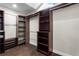 Organized walk-in closet with custom shelving and ample space for storage, enhancing functionality at 170 Sw 80Th St, Ocala, FL 34476