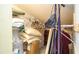 Organized closet featuring wire shelving, pillows, and hanging storage at 20820 River Dr # B32, Dunnellon, FL 34431