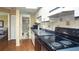 Functional kitchen featuring laminate countertops, black appliances, and tile backsplash at 20820 River Dr # B32, Dunnellon, FL 34431