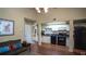 Inviting living area open to the kitchen with a comfortable couch and ample natural light at 20820 River Dr # B32, Dunnellon, FL 34431