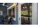 Inviting porch with outdoor seating and a ceiling fan at 20820 River Dr # B32, Dunnellon, FL 34431