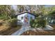 Exterior view of the shed featuring an ornate sunburst pattern on the door at 2151 Se 177Th Ave, Silver Springs, FL 34488