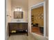Bathroom vanity with hard surface countertop and dark cabinets at 2272 Se Laurel Run Dr, Ocala, FL 34471