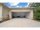 Three-car garage with room for storage and easy access to the outdoors at 2272 Se Laurel Run Dr, Ocala, FL 34471